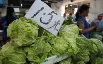 БНХАУ-д өнгөрсөн сард орсон хүчтэй аадар борооны улмаас тариалалт зогсож, хүнсний ногооны үнэ өсжээ