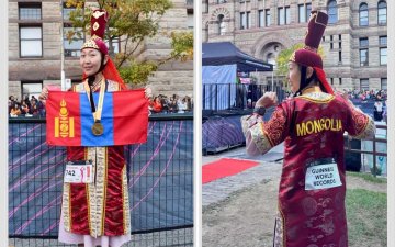 Г.Оюунгэрэл Монгол хатны хувцас өмсөж, марафонд оролцож ДЭЛХИЙН ДЭЭД АМЖИЛТ тогтоожээ