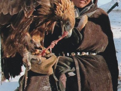 Feeding his eagle